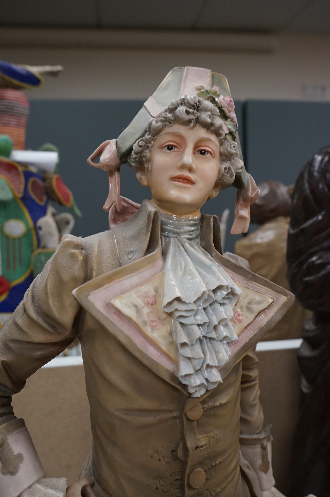 A large Royal Dux figure of a gent, 60cm